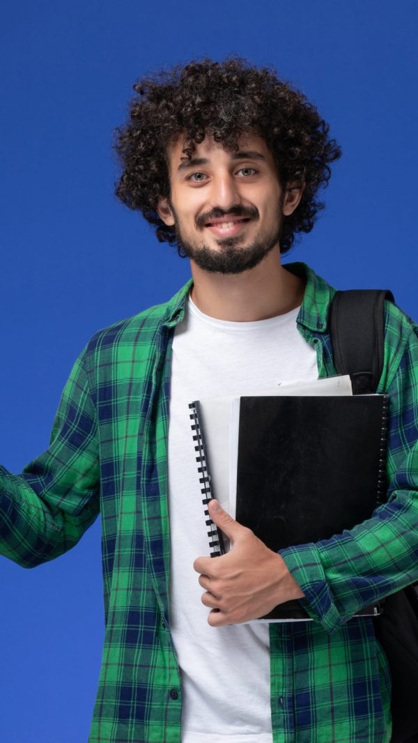 front-view-male-student-green-checkered-shirt-with-black-backpack-holding-copybooks-smiling-blue-wall (1) front-view-male-student-green-checkered-shirt-with-black-backpack-holding-copybooks-smiling-blue-wall (1)